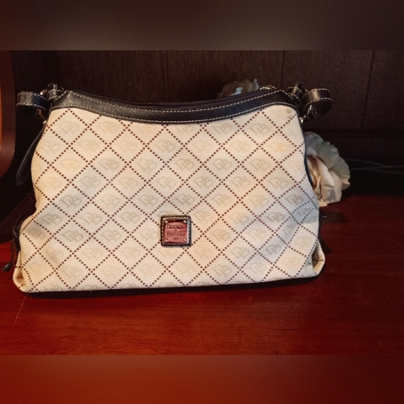 Dooney & Bourke Handbags - Dooney and Bourke East West Slouch canvas signature fabric. Cream and brown.